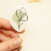 muted green handpainted resin pin