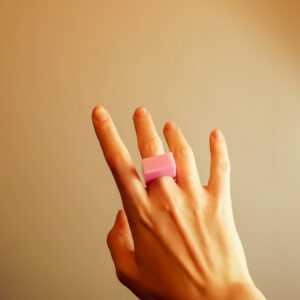 pink ring product photo on hand