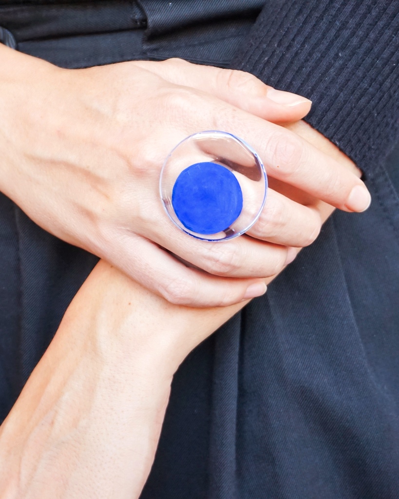 dark blue ring on hand