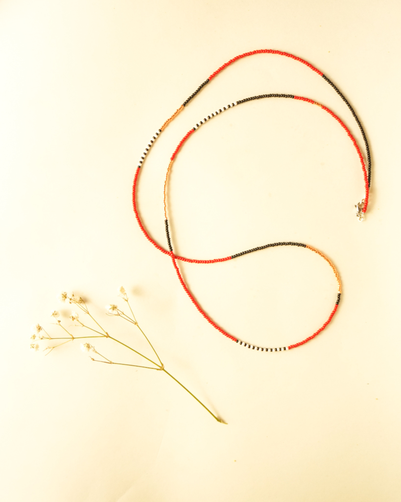 beads red black and bronze