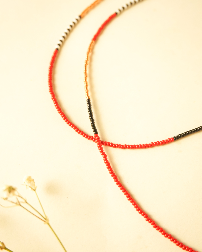 beads red black and bronze