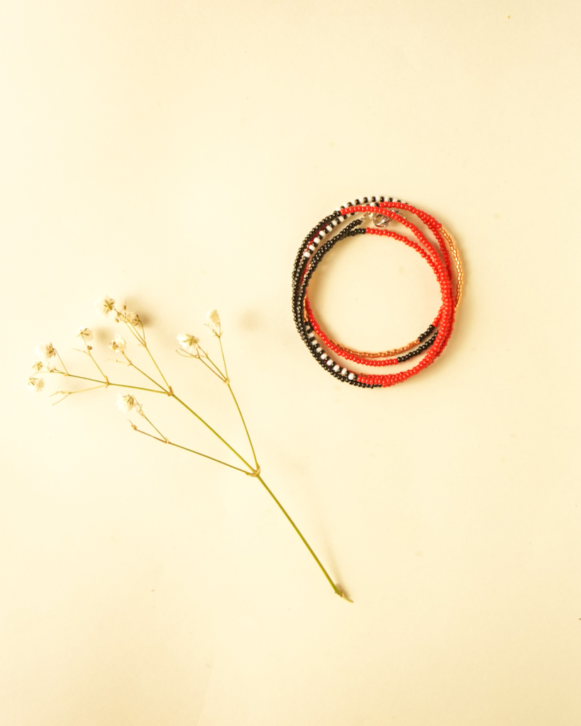 beads red black and bronze