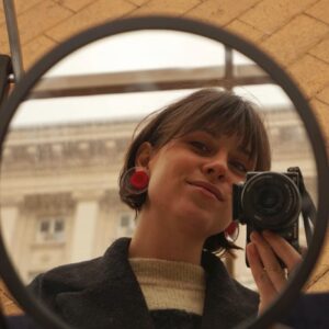 circle earrings red on person