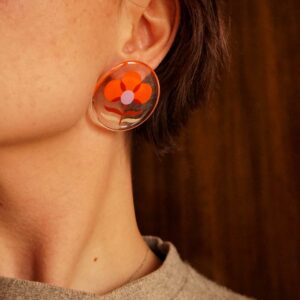 flower power earrings calendula on ear