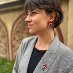 flower power pin poppy on a person